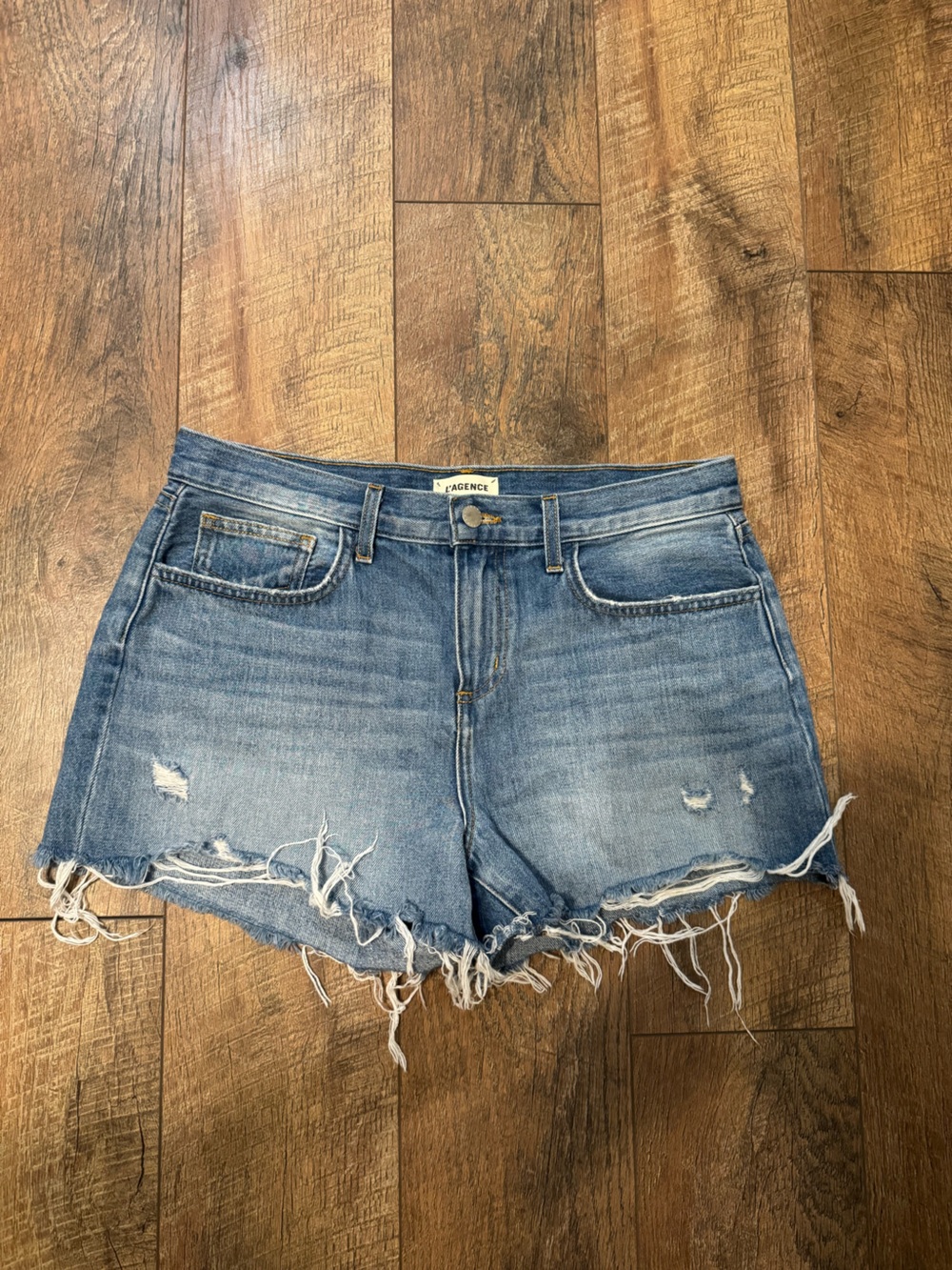 L’AGENCE Faded Blue Distressed Denim Shorts
